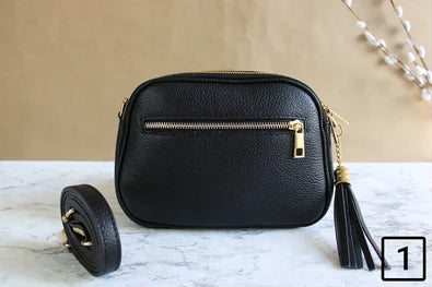 Gold Schwarze Ledertasche mit Riemen